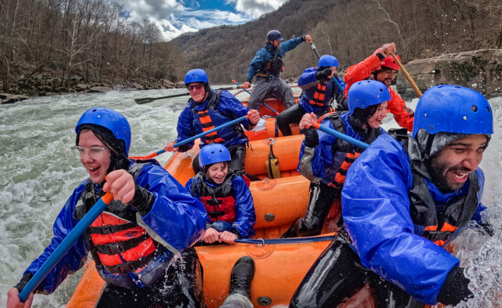 A group of rafters go white water rafting in April