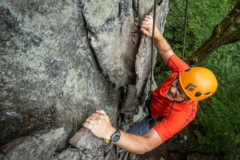 Man Rock Climbing In New River Gorge